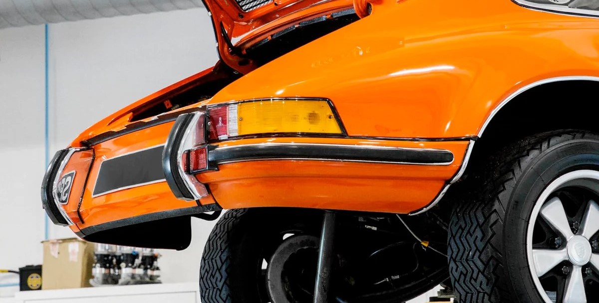 Bumper of Orange Porsche car